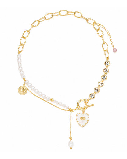 Elegant Mixed-Media Statement Necklace: Gold-Tone Chain, Pearl, and Crystal Accents with Heart Pendant – Chic Asymmetric Jewelry