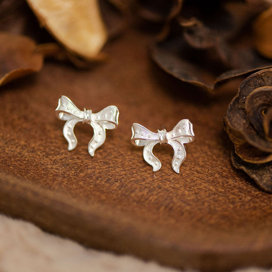 Exquisite design sterling silver fashion bow earrings fashionable temperament ear bone nails s999 silver simple versatile earrings - LEIDAI